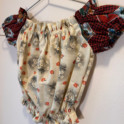 Duck sleeve & black floral top.