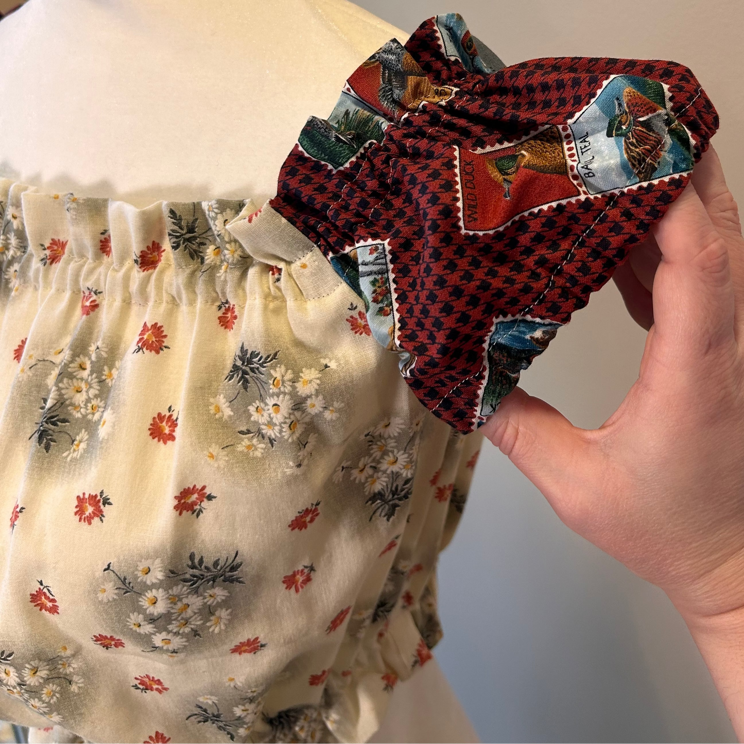 Duck sleeve & black floral top.