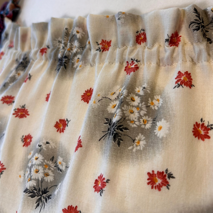 Duck sleeve & black floral top.